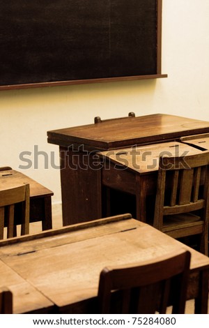 old classroom ,wood chair and desk