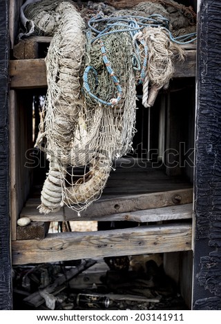 Abstract image of old fishing nets and ropes that has been left to rot.