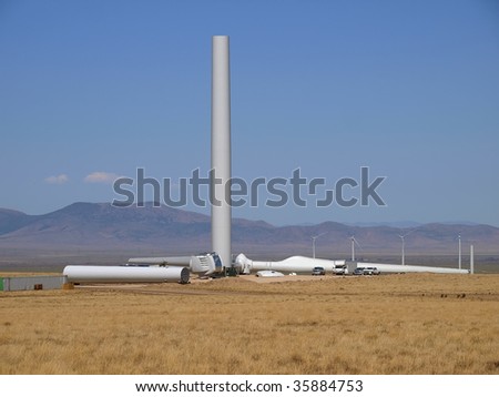Assembling giant wind turbines on wind farm near Milford, Utah