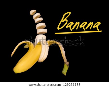 Sliced and peeled banana isolated over black background