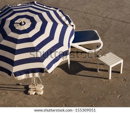 No beach, no worry - city sunbather using concrete block in lieu of beach