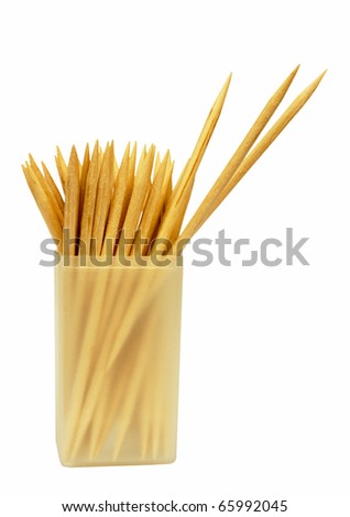 Cocktail stick toothpicks in plastic container - isolated