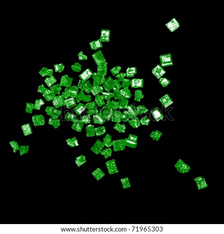 Emerald green crystals on black