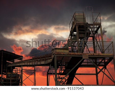 Industrial sunset - disused gravel works silhouetted
