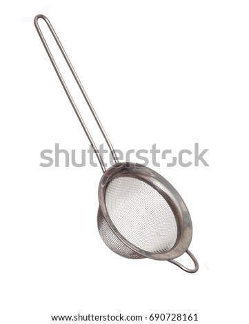 Metal tea strainer isolated on white background.