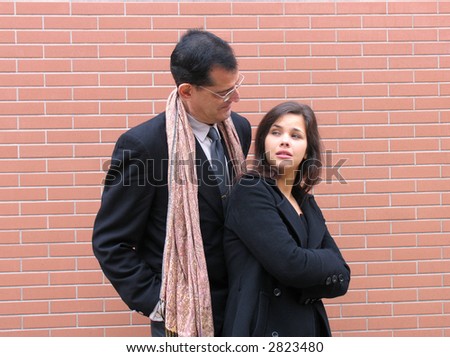 Couple, woman not very interested