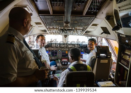 COLOMBO, SRI LANKA - MARCH 27: pilots prepare the plane Boening 747 to take off before a flight to Jeddah, Saudi Arabia on March 27, 2013. Cockpit with pilots of the flight.
