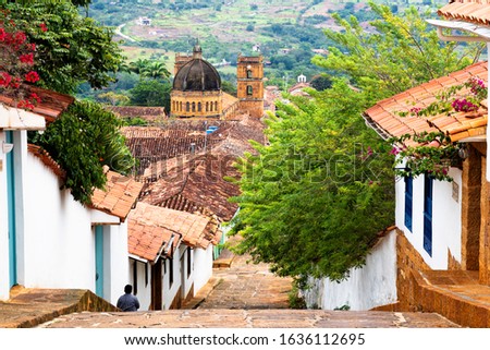 Similar – Image, Stock Photo Old town with white houses and stone ruins at sunset
