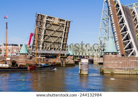 Drawbridge in an open position while the boat is passing by. Taken in Rotterdam, Netherlands