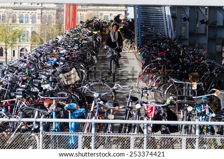 AMSTERDAM, THE NETHERLANDS - NOVEMBER 09: Few storey bicycle parking in Amsterdam, The netherlands on November 09, 2014.