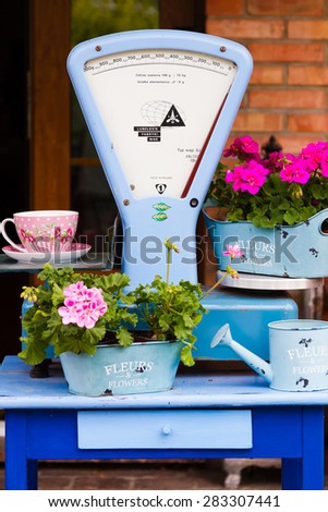 GOCZALKOWICE, POLAND - JULY 31: Vintage food scale in Goczalkowice, Poland on July 31, 2014. Mechanic food scales were commonly used in old days.
