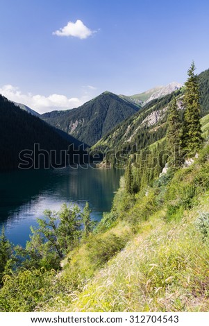 Beautiful view of high mountain lake Kolsai in Kazakhstan, Tien Shan mountains, Central Asia