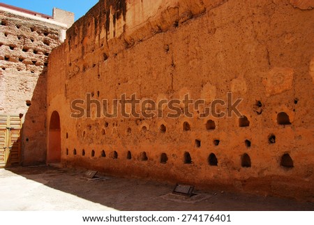 El Badi Palace gardens, Marrakech, Morocco - April 13, 2015: Ruined palace located in Marrakesh, Morocco. Commissioned by the Saadian sultan Ahmad al-Mansur