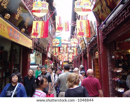 Typical City Street in China.  Shanghai has block after block of stores and shops just like these with tourists galore