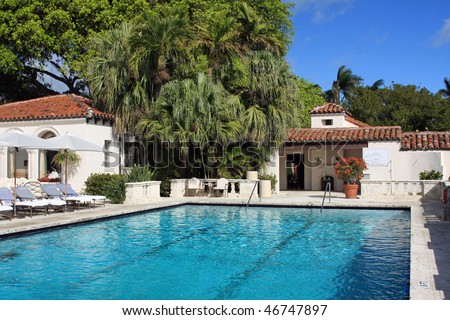 Inviting upscale pool in South Florida, on Fisher Island