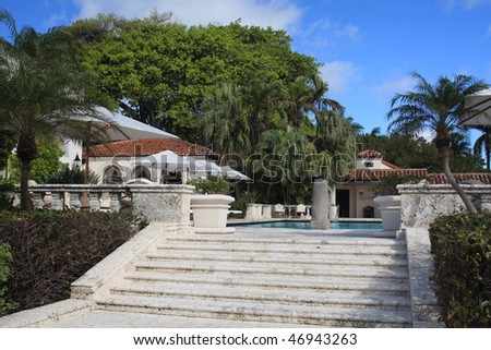 Inviting staircase to an upscale swimming pool in South Florida