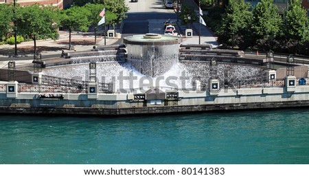Beautiful Centennial Fountain on the River Esplanade along the Chicago River in downtown Chicago
