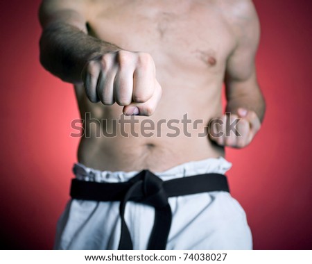 Karate training, man at gym, sport and fitness concept