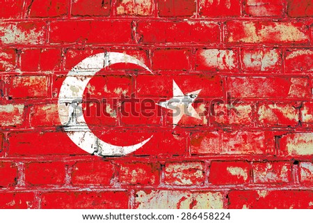 Turkey flag painted on old brick wall texture background