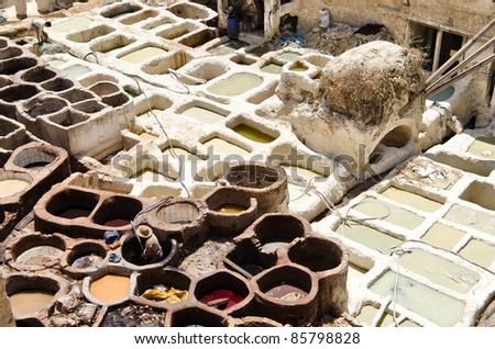 Old tanks of the Fez\'s tanneries with color paint for leather