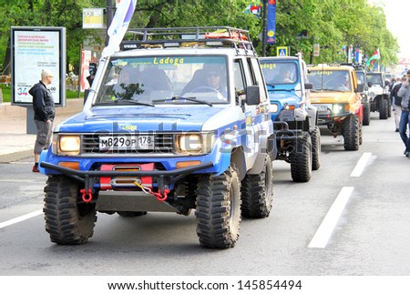 SAINT PETERSBURG, RUSSIA - MAY 25: Konstantin Martynyuk\'s off-road vehicle Toyota Land Cruiser 70 No.612 competes at the annual Ladoga Trophy Challenge on May 25, 2013 in Saint Petersburg, Russia.