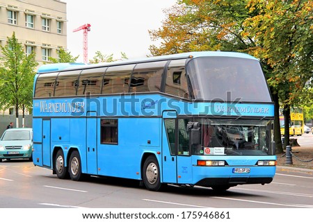 BERLIN, GERMANY - SEPTEMBER 12, 2013: Blue Neoplan N117/3 Loungeliner interurban coach at the city street.