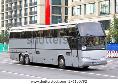 BERLIN, GERMANY - SEPTEMBER 10, 2013: Grey Neoplan N118/3H Cityliner coach at the city street.