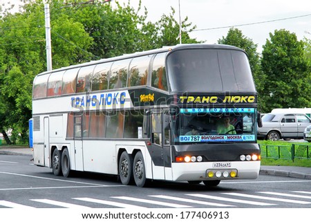 MOSCOW, RUSSIA - JUNE 3, 2012: White Neoplan N128/4 Megaliner interurban coach at the city street.