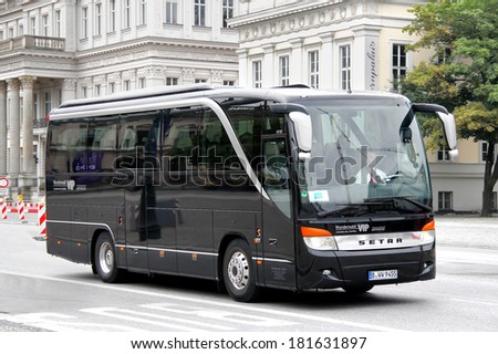 BERLIN, GERMANY - SEPTEMBER 10, 2013: Black Setra S411HD interurban coach at the city street.