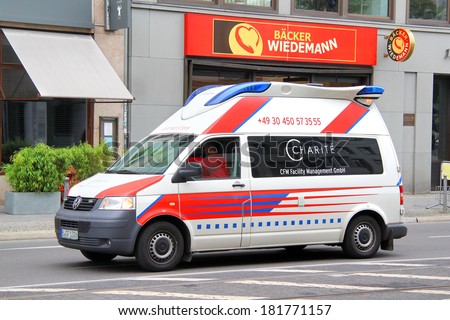 BERLIN, GERMANY - SEPTEMBER 12, 2013: Volkswagen Transporter ambulance car at the city street.