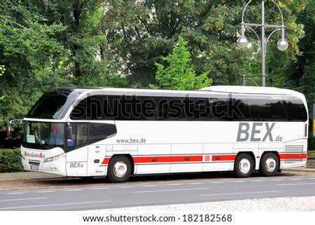 BERLIN, GERMANY - SEPTEMBER 12, 2013: White Neoplan N1217HDC Cityliner interurban coach at the city street.