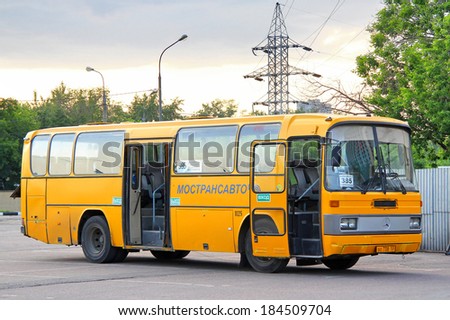 MOSCOW, RUSSIA - JUNE 1, 2013: Yellow Mercedes-Benz O303 interurban coach at the bus station.