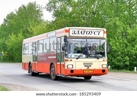 ZLATOUST, RUSSIA - JUNE 12, 2009: Orange MAN SL202 suburban bus at the interurban road.
