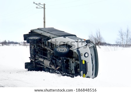 NOVYY URENGOY, RUSSIA - APRIL 12, 2014: Small truck accident at the slimy interurban road.