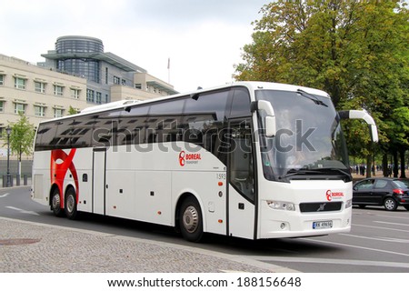 BERLIN, GERMANY - SEPTEMBER 12, 2013: White Carrus 9700HD interurban coach at the city street.