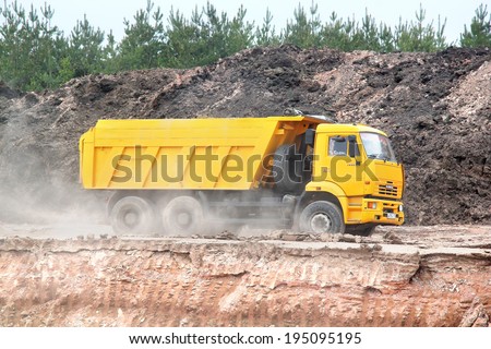 TATARSTAN, RUSSIA - MAY 20, 2013: Yellow KAMAZ 6520 dump truck at the quarry.