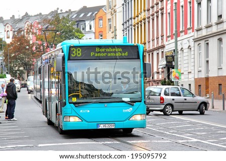 FRANKFURT AM MAIN, GERMANY - SEPTEMBER 15, 2013: Green Mercedes-Benz O530 Citaro city bus of Verkehrsgesellschaft Frankfurt am Main mbH bus company at the city street.