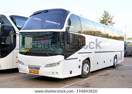 MOSCOW, RUSSIA - MAY 6, 2012: White Neoplan N116 Cityliner interurban coach at the city street.