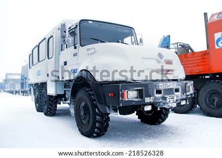 YAMAL, RUSSIA - NOVEMBER 23, 2012: Grey Ural 32551 off-road bus in the snow-covered tundra.