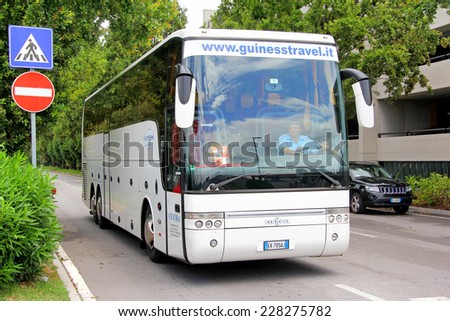 VENICE, ITALY - JULY 30, 2014: Touristic coach Van Hool T916 Astron at the city street.