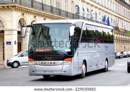 PARIS, FRANCE - AUGUST 8, 2014: Touristic coach Setra S415HD at the city street.