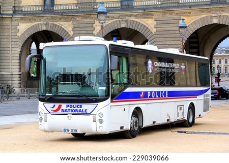 PARIS, FRANCE - AUGUST 8, 2014: Police bus Irisbus Ares at the city street.