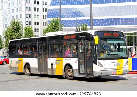 BRUSSELS, BELGIUM - AUGUST 9, 2014: City bus Van Hool A360 at the city street.