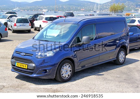 SAINT-TROPEZ, FRANCE - AUGUST 3, 2014: Blue cargo van Ford Transit Connect at the city street.