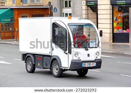 PARIS, FRANCE - AUGUST 8, 2014: Mini electric cargo truck Goupil G3 at the city street.