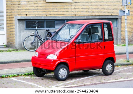 AMSTERDAM, NETHERLANDS - AUGUST 10, 2014: Tiny car Canta LX at the city street.