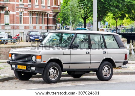AMSTERDAM, NETHERLANDS - AUGUST 10, 2014: Motor car Range Rover Classic at the city street.