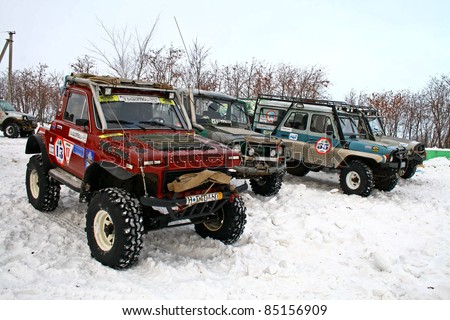 UFA, RUSSIA - DECEMBER 18: Off-road vehicle NIVA #13 of team BASHOFFROAD during annual trophy raid Natural selection on December 18, 2010 in Ufa, Russia.