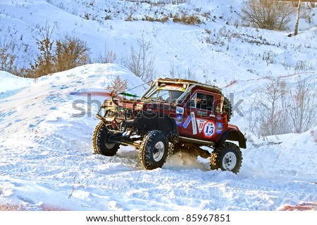 UFA, RUSSIA - DECEMBER 18: Off-road vehicle NIVA (No. 13) of team BASHOFFROAD during annual trophy raid Natural selection on December 18, 2010 in Ufa, Russia.