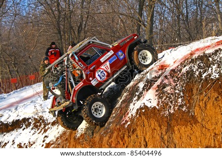UFA, RUSSIA - DECEMBER 18: Off-road vehicle NIVA #13 of team BASHOFFROAD during annual trophy raid Natural selection on December 18, 2010 in Ufa, Russia.